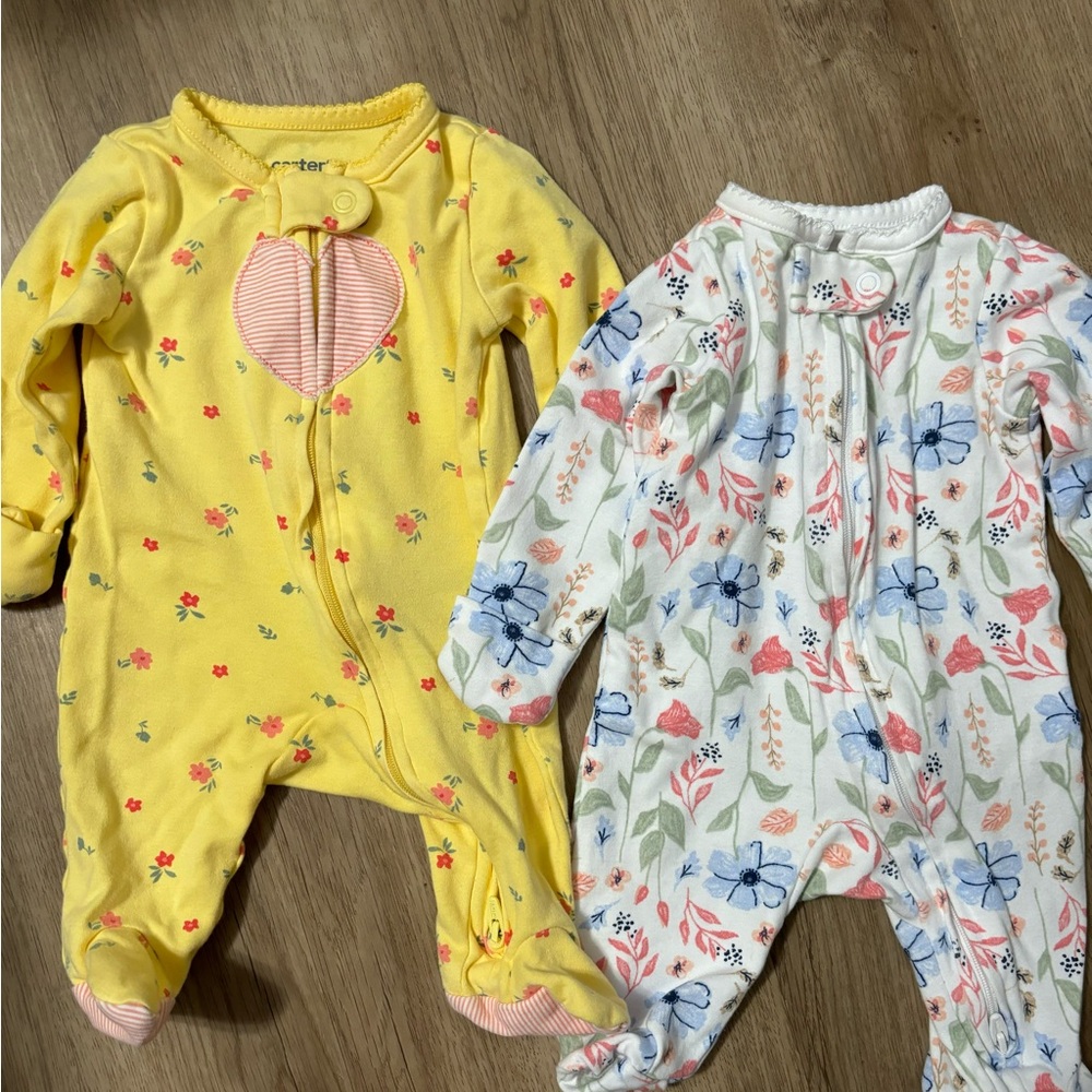 Carters bundle. 2 sleepers included. Size Newborn.